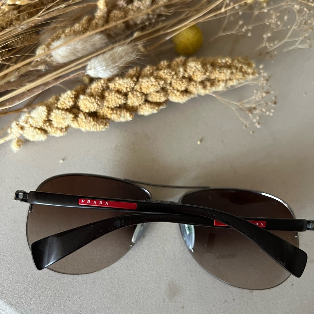 Unisex Authentic Prada Linea Rossa Rimless Aviator Sunglasses – Brown Lenses